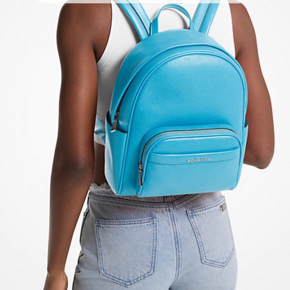 Michael Kors Bex Medium Pebbled Leather Backpack-very good used 
SANTORINI BLUE